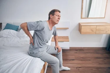 Why Does My Lower Back Hurt When I First Get Out of Bed?